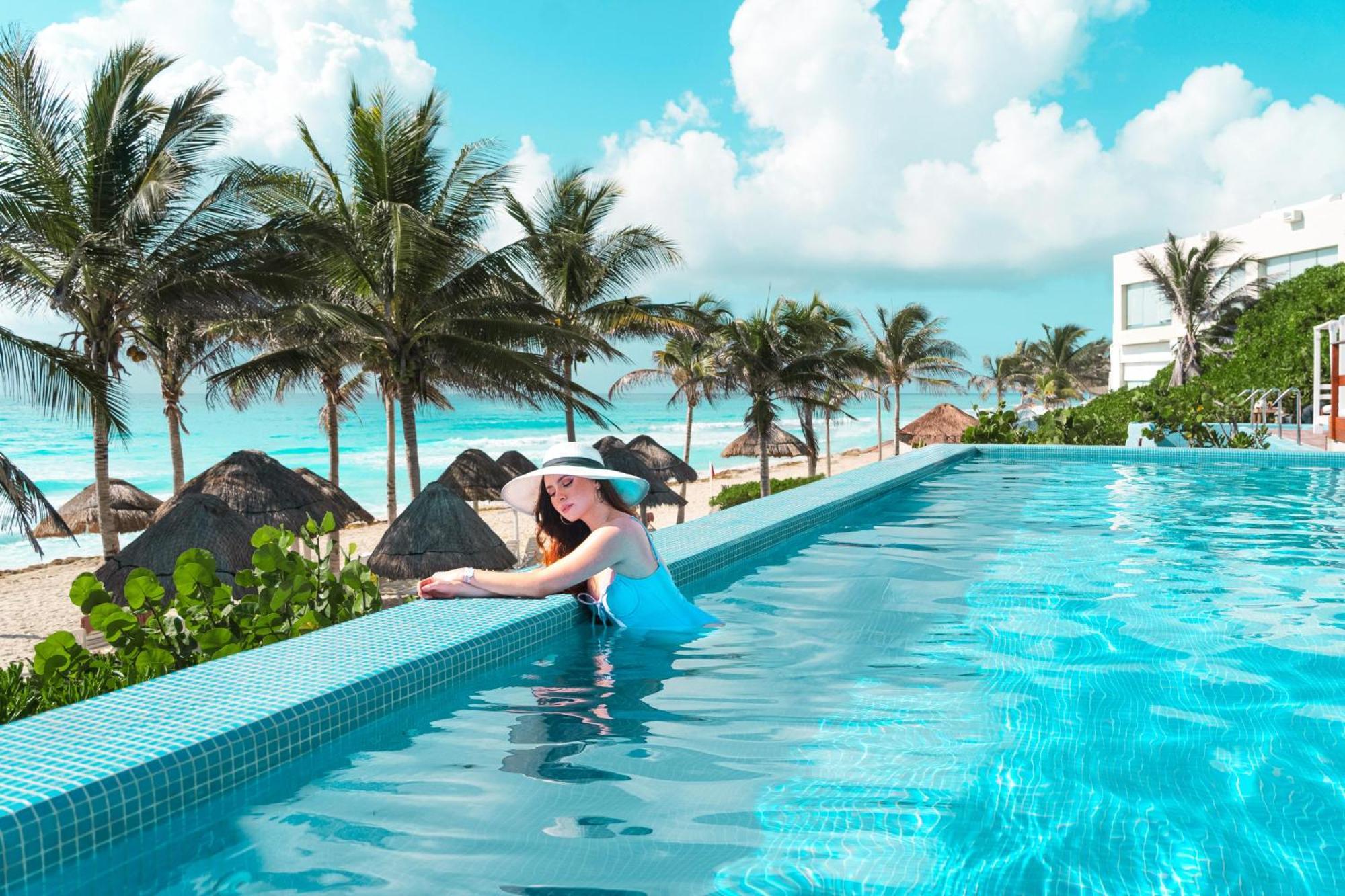 The Pyramid Cancun By Oasis Экстерьер фото Infinity pool at the Grand at Moon Palace, Cancun, Mexico